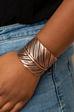 Load image into Gallery viewer, Embossed in life-like texture, an antiqued copper feather delicately curls around the wrist, creating a whimsical cuff.  Sold as one individual bracelet.
