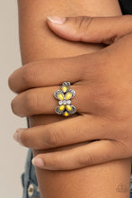 Load image into Gallery viewer, Featuring a white rhinestone encrusted center, a yellow beaded silver butterfly adorns the finger for a colorfully whimsical look. Features a dainty stretchy band for a flexible fit.  Sold as one individual ring.
