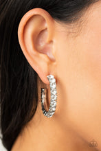 Load image into Gallery viewer, An oversized collection of glittery white rhinestones are encrusted along a textured silver hoop, creating a glamorous sparkle. Earring attaches to a standard post fitting. Hoop measures approximately 1 1/2&quot; in diameter.  Sold as one pair of hoop earrings.
