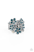 Load image into Gallery viewer, A whimsical collection of glassy white beads and shiny blue floral frames dot three shimmery silver bands across the finger, coalescing into a colorful centerpiece. Features a stretchy band for a flexible fit.  Sold as one individual ring.
