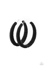 Load image into Gallery viewer, Earthy black twine-like cording is wrapped around a thick hoop, creating a colorful rustic display. Earring attaches to a standard post fitting. Hoop measures approximately 2 1/4&quot; in diameter.  Sold as one pair of hoop earrings.
