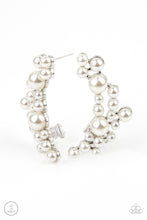 Load image into Gallery viewer, A collection of bubbly white pearls dot a shiny silver frame that branches up the ear for a modern, timeless twist. Earring attaches to a standard post fitting. Features a clip-on fitting at the top for a secure fit.  Sold as one pair of ear crawlers.
