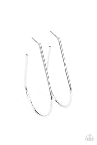 A shiny silver bar sleekly curls into an elongated hoop for a chic look. Earring attaches to a standard post fitting. Hoop measures approximately 1 1/2" in diameter.  Sold as one pair of hoop earrings.