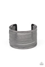 Load image into Gallery viewer, Twisted rows of gunmetal wire layer between two flat gunmetal bars, coalescing into a boldly stacked cuff around the wrist.  Sold as one individual bracelet.
