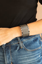 Load image into Gallery viewer, Twisted rows of gunmetal wire layer between two flat gunmetal bars, coalescing into a boldly stacked cuff around the wrist.  Sold as one individual bracelet.
