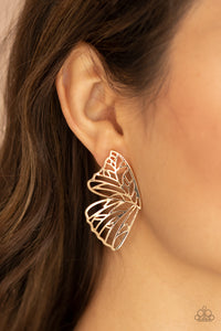 Shimmery gold bars delicately climb scalloped gold frames, coalescing into a whimsical butterfly wing. Earring attaches to a standard post fitting.  Sold as one pair of post earrings.