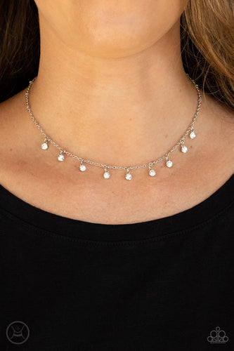 Glassy white rhinestones swing from a dainty silver chain, creating a glamorous fringe around the neck. Features an adjustable clasp closure.  Sold as one individual choker necklace. Includes one pair of matching earrings.