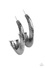 Load image into Gallery viewer, Etched in sporadic linear patterns, two shimmery gunmetal frames join into a hollow hook that flares out into an eye-catching hoop. Earring attaches to a standard post fitting. Hoop measures approximately 1 1/2&quot; in diameter.  Sold as one pair of hoop earrings.
