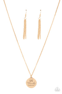 Infused with feathery accents, a shiny gold disc is stamped in the phrase, "Give Thanks," at the bottom of a shimmery gold chain. Features an adjustable clasp closure.  Sold as one individual necklace. Includes one pair of matching earrings.