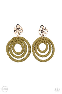 A hammered gold disc attaches to rippling hoops wrapped in green wicker-like cording, creating an earthy lure. Earring attaches to a standard clip-on fitting.  Sold as one pair of clip-on earrings.