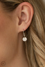 Load image into Gallery viewer, Hammered disc hanging from a silver fish hook earring.
