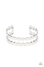 Load image into Gallery viewer, Brushed in a shiny finish, rows of flattened silver studs coalesce into a shimmery cuff around the wrist.  Sold as one individual bracelet.
