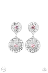 Dotted with glittery pink rhinestone centers, shimmery silver floral frames link into a whimsical lure. The lower frame is bordered in glassy white rhinestones for a timeless finish. Earring attaches to a standard clip-on fitting.  Sold as one pair of clip-on earrings.