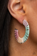 Load image into Gallery viewer, Multicolored wicker-like cording wraps around a thick silver hoop, creating a flirty pop of color. Earring attaches to a standard post fitting. Hoop measures approximately 1 1/2&quot; in diameter.  Sold as one pair of hoop earrings.
