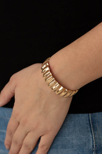 Polished in a high sheen finish, a crinkled gold cuff delicately curls around the wrist for an intense industrial look.  Sold as one individual bracelet.
