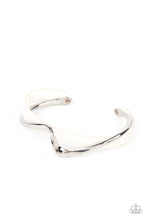 Load image into Gallery viewer, A flat silver bar delicately curls across a dainty white shell-like acrylic cuff, creating a whimsical centerpiece around the wrist.  Sold as one individual bracelet.
