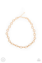 Load image into Gallery viewer, A collection of oversized gold ovals and glistening gold fittings interlock around the neck, creating an intense industrial look. Features an adjustable clasp closure.  Sold as one individual choker necklace. Includes one pair of matching earrings.   
