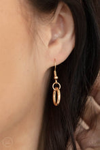 Load image into Gallery viewer, Gold oval link hanging from a gold fish hook earring.
