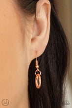 Load image into Gallery viewer, Copper oval link hanging from a fish hook earring.
