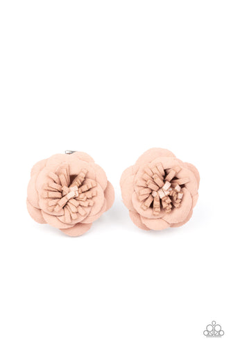 Papery rustic pink petals gather around lifelike textured centers, creating a pair of dainty blossoms for a colorful seasonal flair. Each flower features a standard hair clip on the back.  Sold as one pair of hair clips.