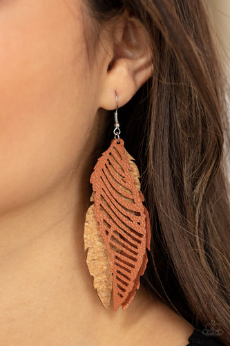 A mismatched collection of cork and brown leather feather frames flutter from the ear, layering into a free-spirited lure. Earring attaches to a standard fishhook fitting.  Sold as one pair of earrings.