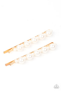 Dainty and classic pearls alternate along a pair of gold bobby pins, creating a bubbly display.  Sold as one pair of decorative bobby pins.