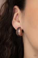 Load image into Gallery viewer, The center of a round copper frame is embossed in textured columns, accentuating the frame&#39;s dainty curve. Earring attaches to a standard clip-on fitting.  Sold as one pair of clip-on earrings.
