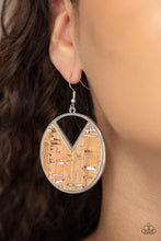 Load image into Gallery viewer, Featuring hints of white accents, an earthy piece of cork is placed into the center of a circular hoop. A triangular slice is removed from the cork, creating an edgy airy finish. Earring attaches to a standard fishhook fitting.  Sold as one pair of earrings.
