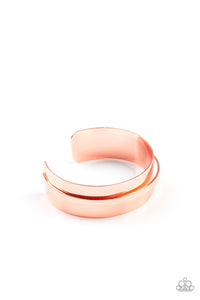 A flat shiny copper bar curves around the center of a thick shiny copper cuff, creating a chic stacked look.  Sold as one individual bracelet.