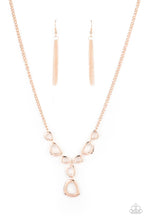 Load image into Gallery viewer, Irregular shaped rose gold rings connect to a rose gold chain as they make their way across the collar. Two rings dangle from the center for a stylish avant-garde fashion. Features an adjustable clasp closure. Includes one pair of matching earrings.
