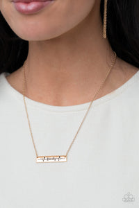 The word "Family," is inscribed between symbolic life lines on a shining rectangular gold plate creating an affectionate keepsake on a dainty gold chain below the collar. Features an adjustable clasp closure.  Sold as one individual necklace. Includes one pair of matching earrings.