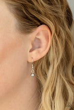 Load image into Gallery viewer, Small bead hanging from a silver fish hook earring.
