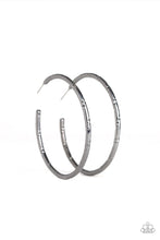 Load image into Gallery viewer, Etched in ribbons of diamond-cut shimmer, a shiny gunmetal hoop curls around the ear for a classic look. Earring attaches to a standard post fitting. Hoop measures 2 1/4&quot; in diameter.  Sold as one pair of hoop earrings.

