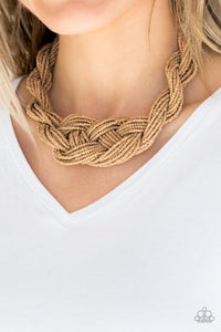 Countless strands of brown tan seed beads are twisted and knotted together to create an unforgettable statement piece. Features an adjustable clasp closure. Sold as one individual necklace. Includes one pair of matching earrings.