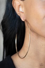 Load image into Gallery viewer, A classic gold bar curls into an outrageously oversized hoop for a trendsetting look. Earring attaches to a standard post fitting. Hoop measures approximately 4&quot; in diameter.  Sold as one pair of hoop earrings.
