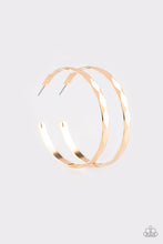 Load image into Gallery viewer, Featuring edgy diamond-cut texture, a glistening gold hoop curls around the ear in a bold industrial fashion. Earring attaches to a standard post fitting. Hoop measures 2 1/4” in diameter. Sold as one pair of hoop earrings.
