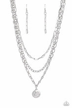Load image into Gallery viewer, A trio of silver paperclip, classic, and oval link chains coalesces down the neckline for a monochromatic masterpiece. Strung on the lowermost oval link chain, a silver smiley face pendant, with a star mimicking a wink for one of its eyes, stands out and reflects light in every direction for a statement finish. Features an adjustable clasp closure.  Sold as one individual necklace. Includes one pair of matching earrings.
