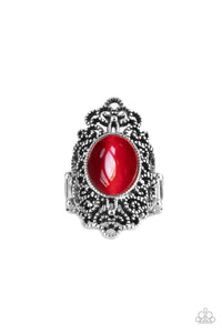 An oval Fire Whirl cat's eye stone is pressed into the center of a backdrop of studded vine-like filigree, creating an enchanting centerpiece atop the finger. Features a stretchy band for a flexible fit.  Sold as one individual ring.