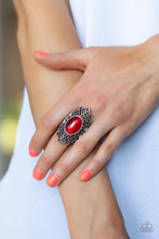 Load image into Gallery viewer, An oval Fire Whirl cat&#39;s eye stone is pressed into the center of a backdrop of studded vine-like filigree, creating an enchanting centerpiece atop the finger. Features a stretchy band for a flexible fit.  Sold as one individual ring.
