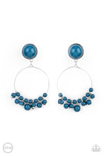 Load image into Gallery viewer, Shiny blue beads are threaded along a dainty wire hoop that attaches to an oversized blue beaded fitting, creating a bubbly fringe. Earring attaches to a standard clip-on fitting.  Sold as one pair of clip-on earrings.
