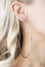 Load image into Gallery viewer, A classic silver bar curls into an outrageously oversized hoop for a trendsetting look. Earring attaches to a standard post fitting. Hoop measures approximately 4&quot; in diameter.  Sold as one pair of hoop earrings.
