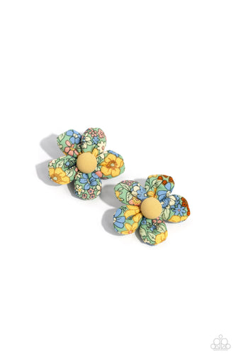 Dotted with yellow button top centers, colorful floral fabrics gather into a pair of puffy blossoms. Features standard hair clips on the back. Sold as one pair of hair clips.