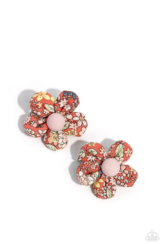 Dotted with pink button top centers, colorful floral fabrics gather into a pair of puffy blossoms. Features standard hair clips on the back.  Sold as one pair of hair clips.