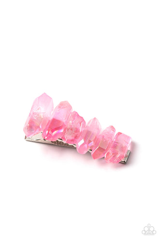 Raw cut iridescent rose quart crystals stack across the front of a rectangular silver frame, creating an ethereally earthy centerpiece. Features a standard hair clip on the back.  Sold as one individual hair clip.