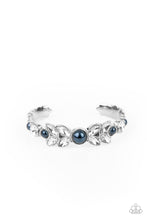 Load image into Gallery viewer, Dotted with bubbly blue pearls, an oversized collection of round and marquise style white rhinestones boldly coalesce into a sparkly centerpiece that is flanked by stacks of leafy silver frames that gracefully curve into a decorative cuff.  Sold as one individual bracelet.
