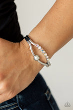 Load image into Gallery viewer, A row of iridescent rhinestones and a solitaire white pearl adorn the layered center of a classic silver cuff, creating a timeless piece around the wrist.  Sold as one individual bracelet.
