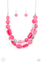 Load image into Gallery viewer, Varying in shape and opacity, a vibrant collection of faceted and smooth Raspberry Sorbet beads join textured silver discs and dainty silver beads along two thin wires, layering into a flamboyant pop of color below the collar. Features an adjustable clasp closure. Includes one pair of matching earrings.
