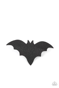 A black leather bat silhouette seemingly takes flight as it sits atop a silver clip creating an eerie illusion. Features a standard hair clip on the back.  Sold as one individual hair clip.