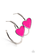 Load image into Gallery viewer, A charming Fuchsia Fedora heart adorns the front of a classic silver hoop resulting in a whimsical fashion. Earring attaches to a standard post fitting. Hoop measures approximately 1 1/4&quot; in diameter.  Sold as one pair of hoop earrings.
