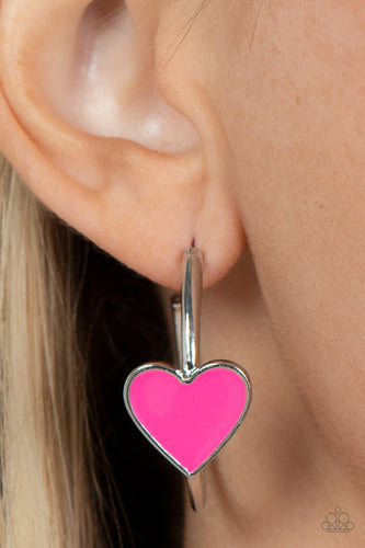 A charming Fuchsia Fedora heart adorns the front of a classic silver hoop resulting in a whimsical fashion. Earring attaches to a standard post fitting. Hoop measures approximately 1 1/4